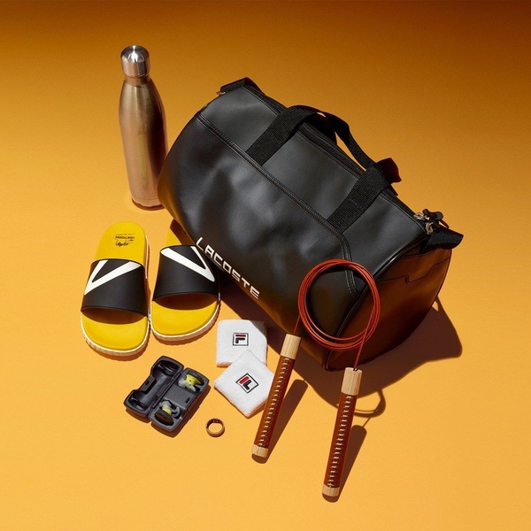 duffel bag, gym bag, sports bag, travel duffel, workout bag, athletic bag, bundle offer, brand awareness, flat lay, energetic, bold, orange, black, yellow